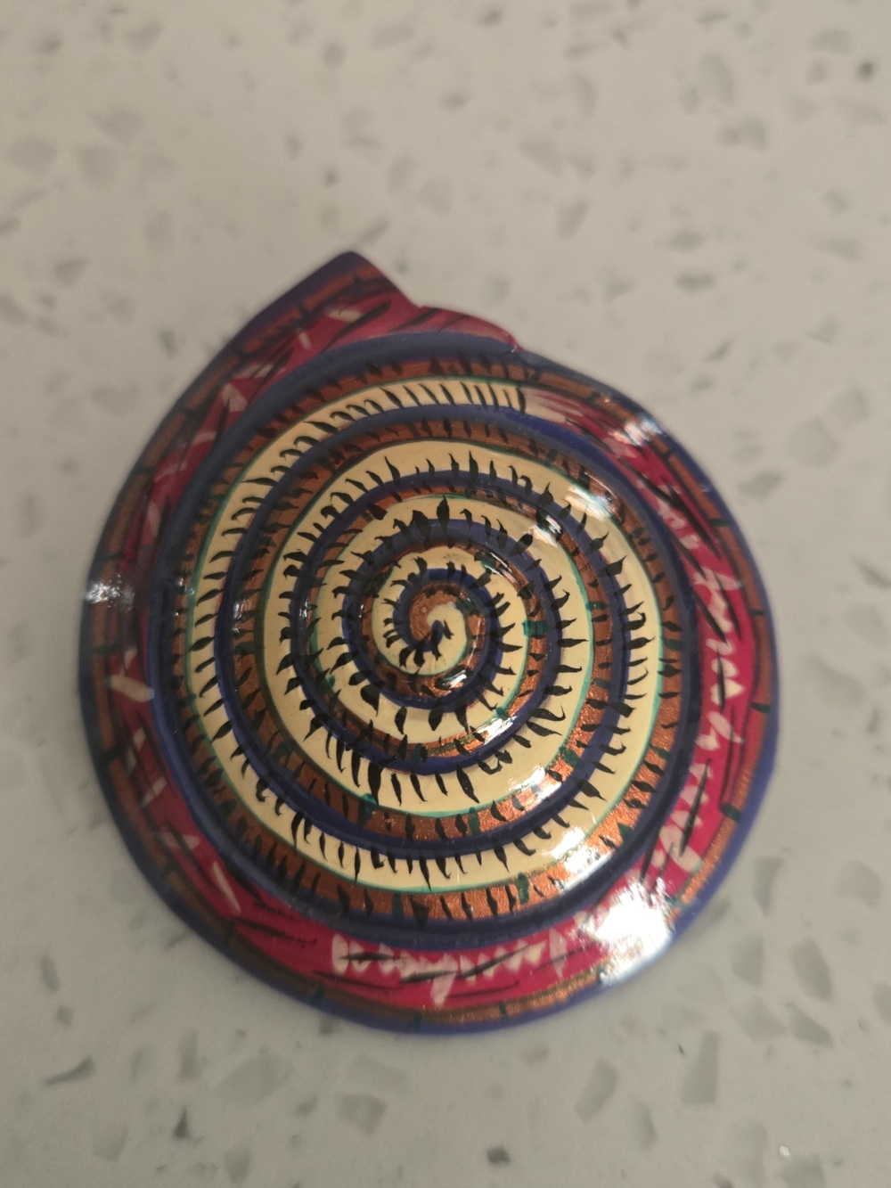 Hand-Painted Spiral Shell Brooch in Red, Blue and Gold